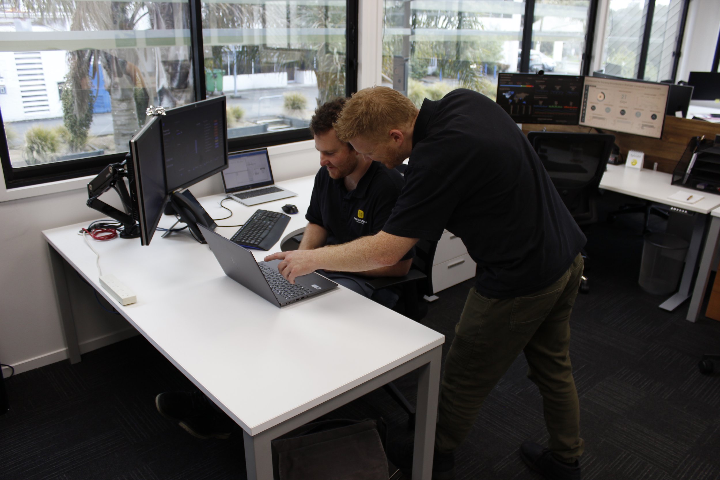 The New Solutions team at work in the Auckland office